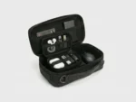 Inside view of electronics organizer bag showing cables, charger, and power bank storage. (1)
