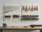 Tool organization wall panel holding pliers, screwdrivers, and bins.