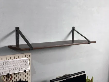 Side view of felt shelf holder showing minimalist mounting style.